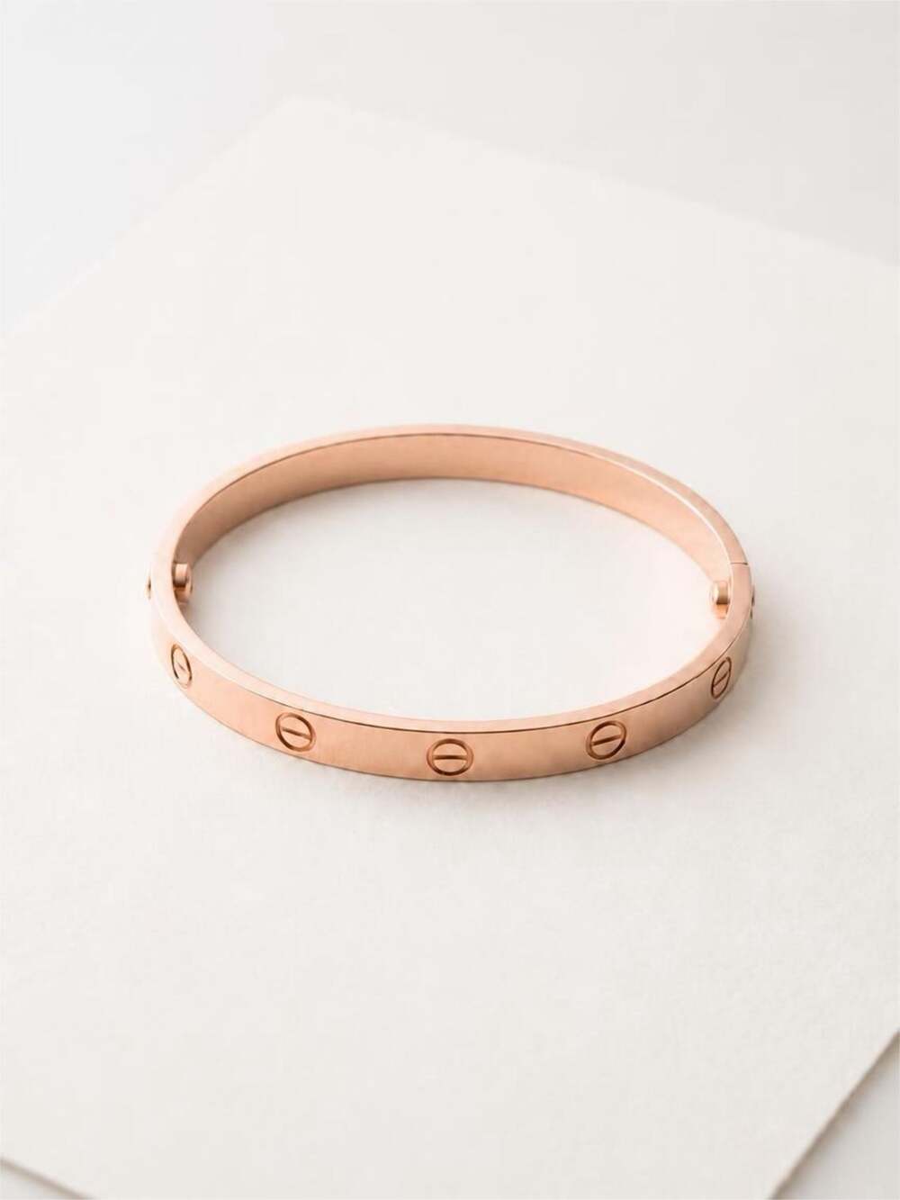 Rosegold clip on fashion screw motif bangle